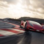 Red sports car on racetrack